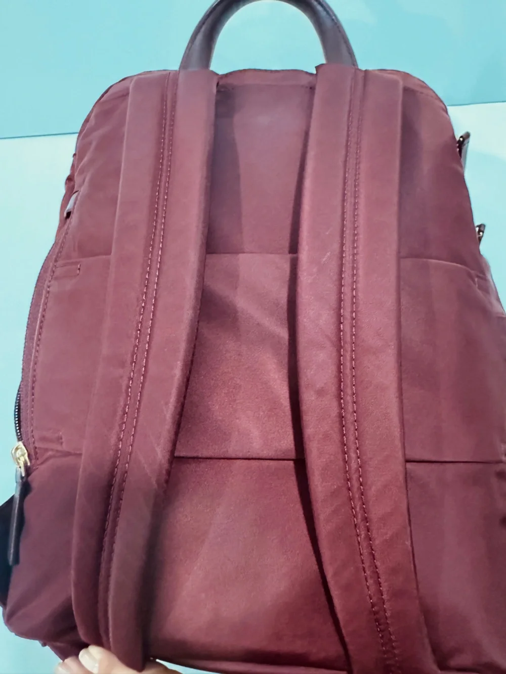 TUMI Unisex Voyageur Hilden Beetroot color Backpack with Gold Hardware